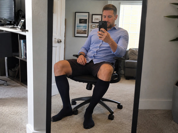 Happy customer wearing The Well Socks