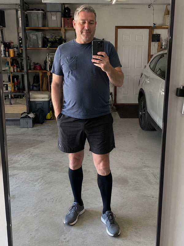 Happy customer wearing The Well Socks